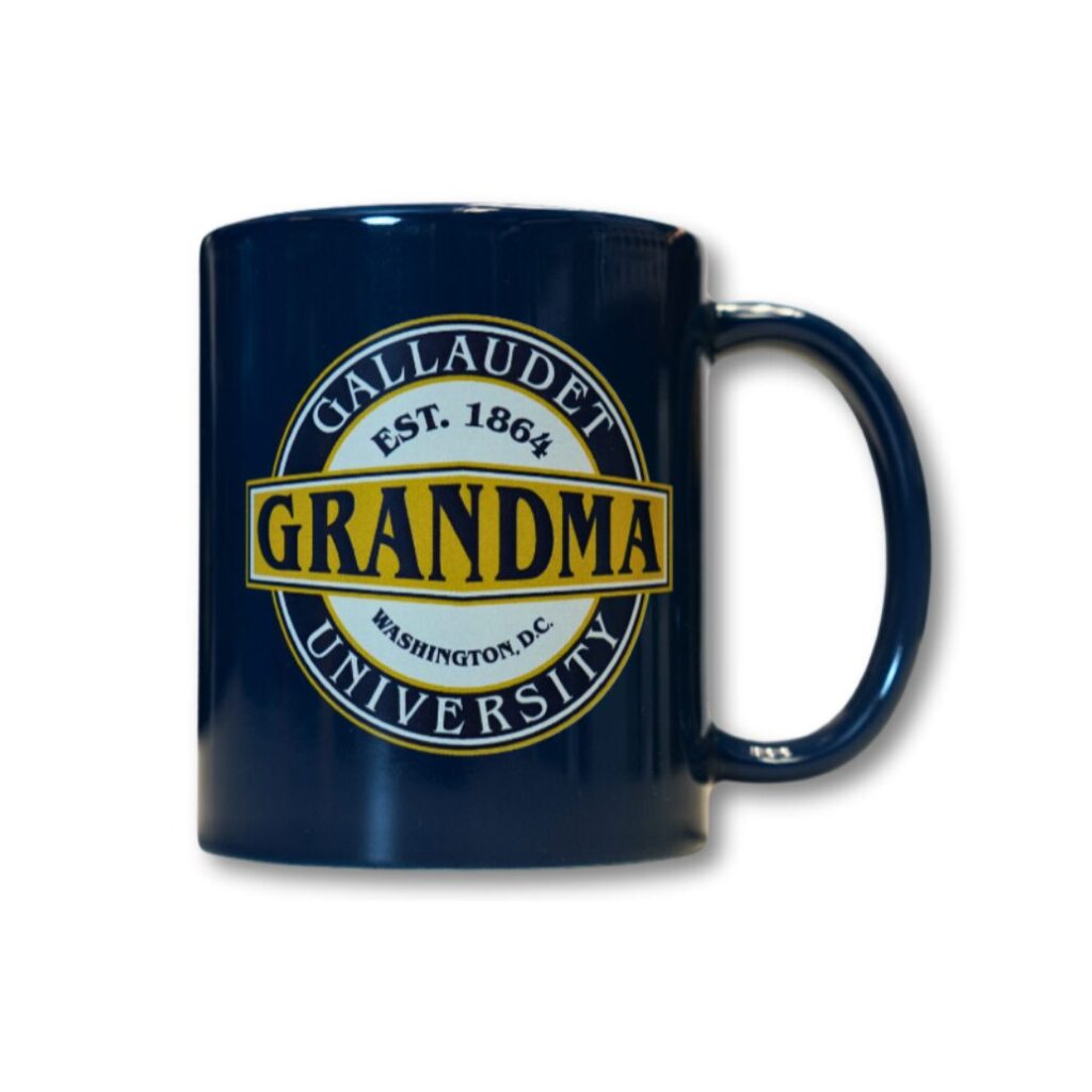 A blue mug on a white background. The mug has a circular design, with the word "Grandma" over the middle in a yellow box. Words at the top and bottom of the circle form "Gallaudet University / Est. 1864 / Washington, DC".