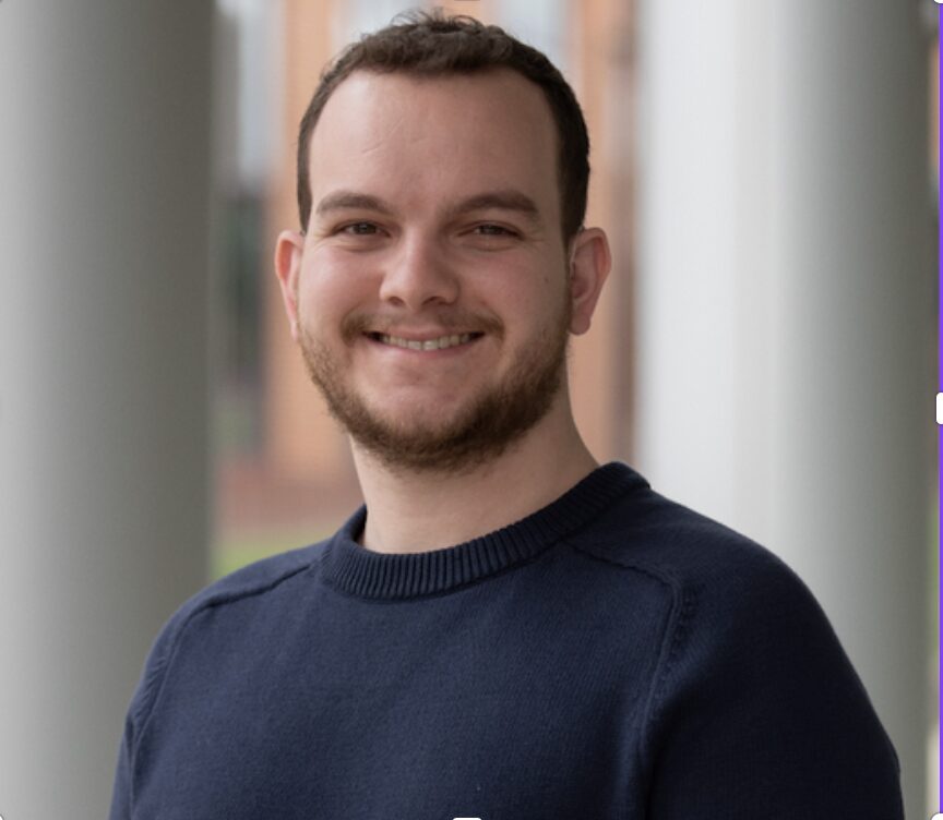 Man in a navy blue sweater